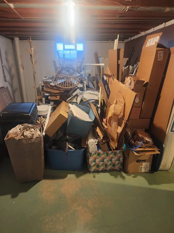 Roll-off dumpster container at job site for 2 Yard Dumpster Rental in Prospect Heights